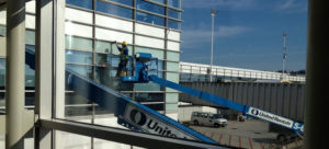 using a lift to clean commercial windows