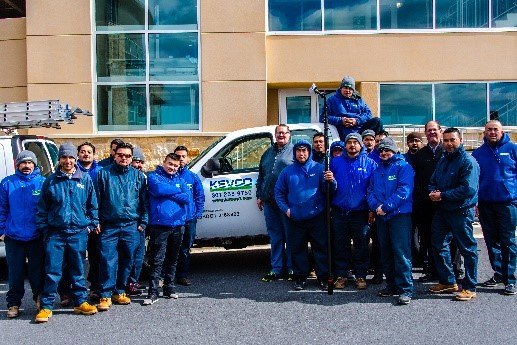 kevco workers standing in front of a service truck